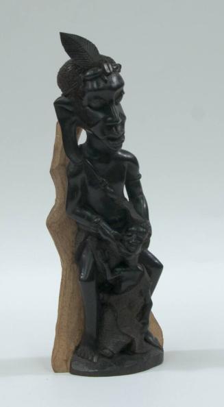 untitled [Makonde, male figure with child]