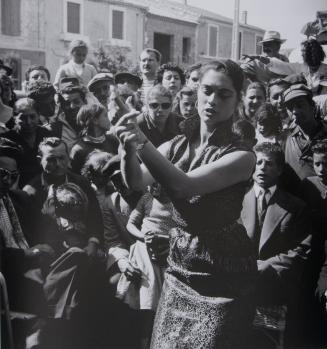 Gypsy girl dancing in front of Manitas de Plata, Stes Maries de la Mer