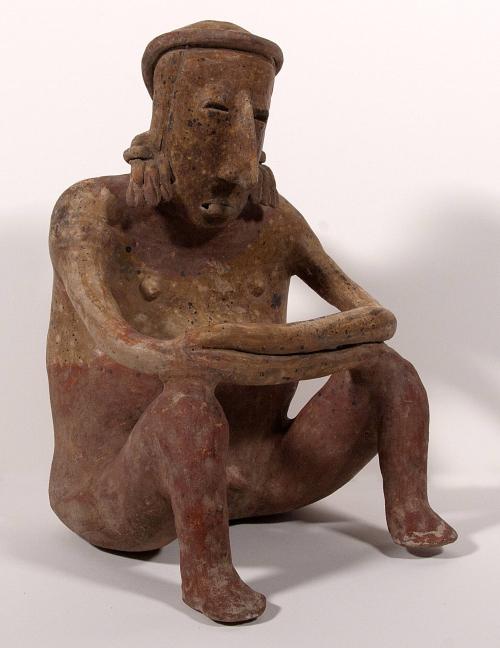 [Seated male figure]