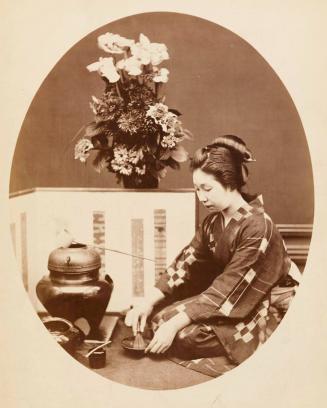 [Woman making tea]