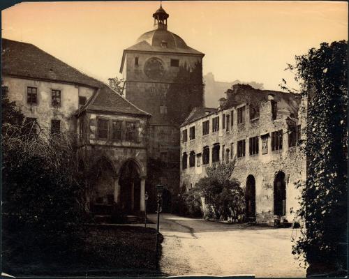 [Ruined building along path]