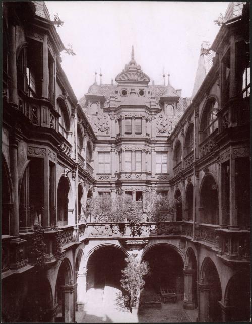 [Buildings surrounding a courtyard]