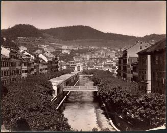 [Buildings lining a water channel]