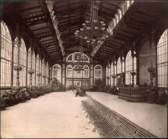 [Windowed interior with benches]