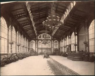 [Windowed interior with benches]