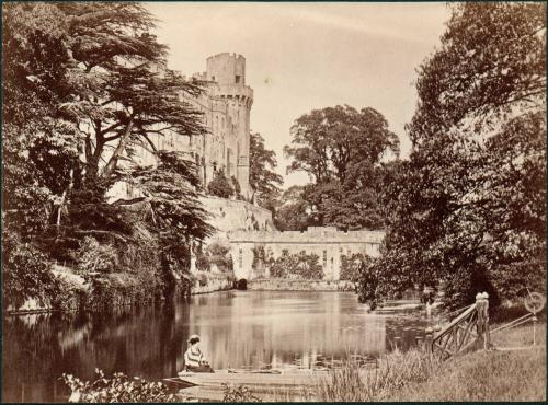 untitled [landscape with castle, lake, woman sitting in a boat]