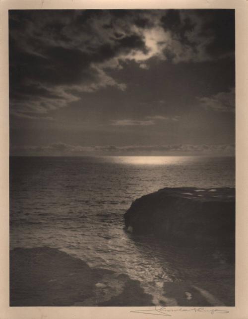 untitled [rocky coast, ocean horizon, cloudy sky with sun]