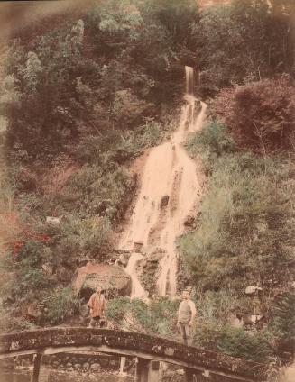 Man and Woman on Footbridge and Waterfall