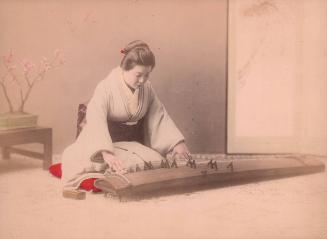 Woman Playing a Koto
