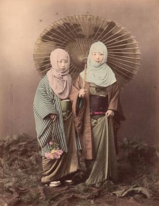 Two women with umbrella