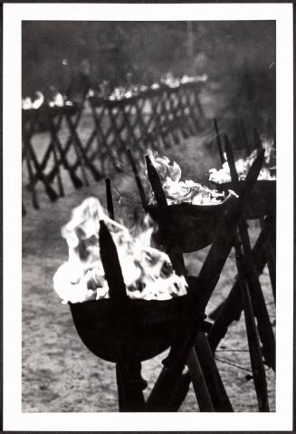 [Fires burn in helmets for fallen soldiers, Jerusalem, Israel]