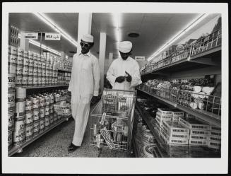 Shopping for the latest in imported and local goods in a new Matrah supermarket, near Muscat, Oman