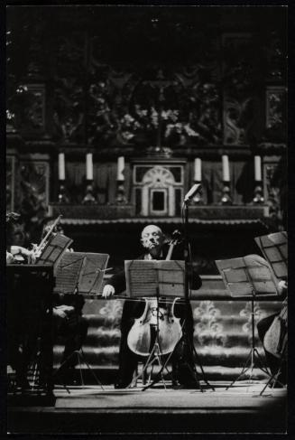 Spanish cellist Pablo Casals performing on stage