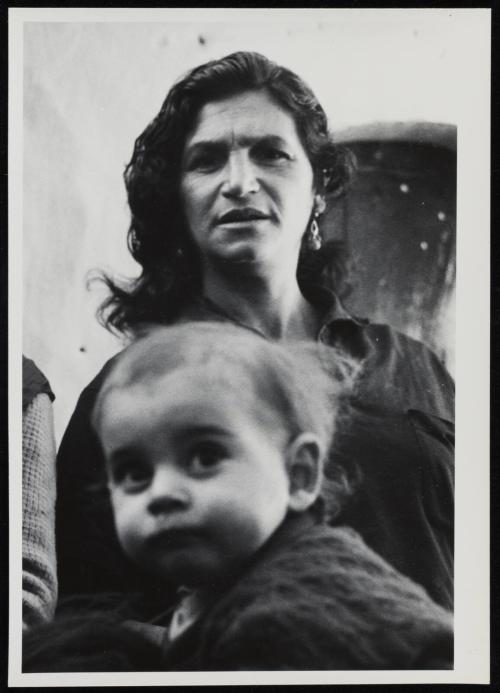 Portrait of dark-haired woman and child