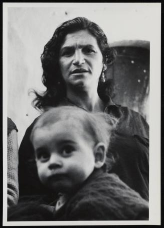 Portrait of dark-haired woman and child