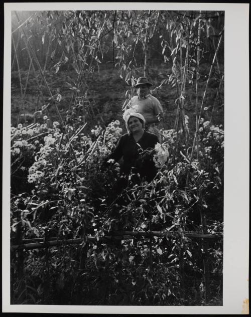 Peasant man and woman in the field, Rome, Italy