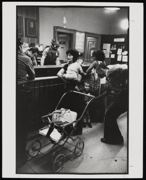 Inside station house: Woman reporting her child is missing, 9th Police Precinct, New York City