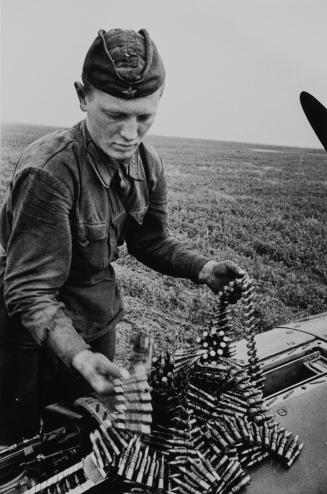 Gunner Loading Ammunition