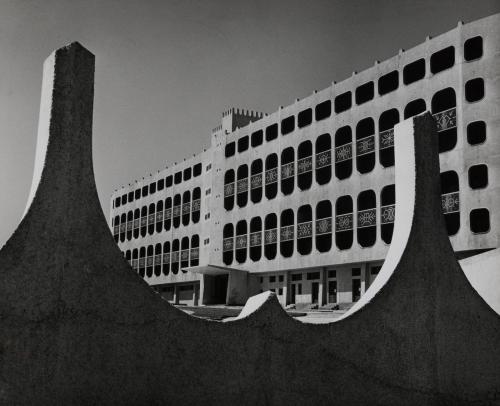 A newly constructed building with decorative trim, likely Sudan