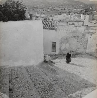 Untitled [Woman on cobblestone street] Ibiza, Balearic Islands, Spain