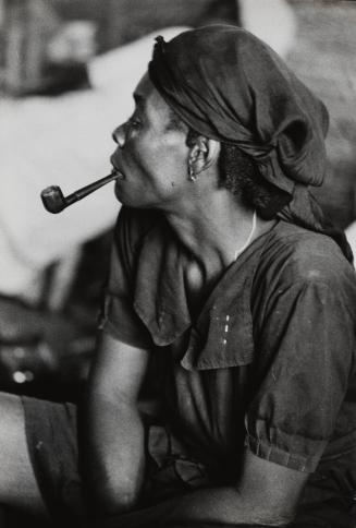 Woman smoking pipe, Haiti