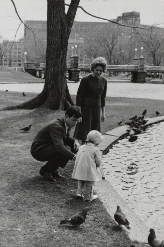 Ted and Joan Kennedy with daughter, Kara, near fountain, Boston