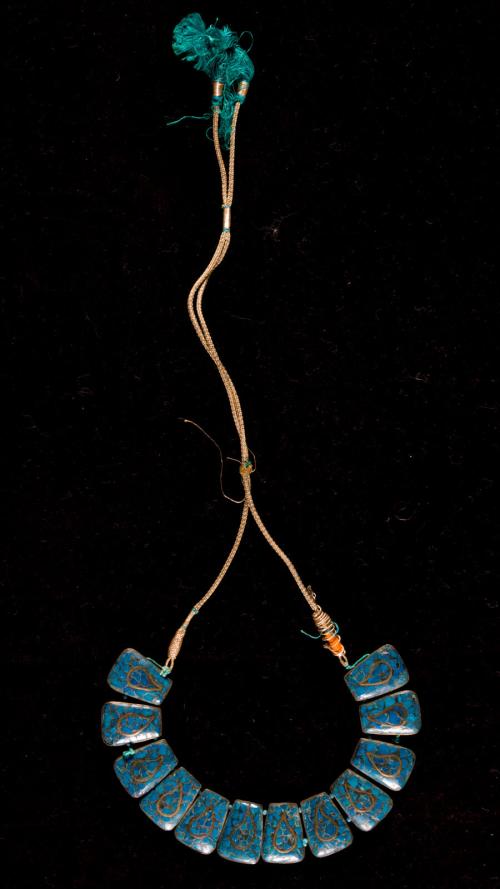 [Turquoise necklace with mango leaf design]