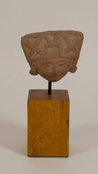 [Effigy head with headdress]