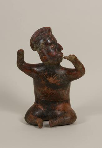 [Seated warrior figure]