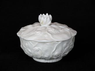 [Lidded parian bowl with applied flower handle on lid and hight relief flower and leaf decoration]