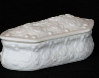 [Lidded parian trinket box with six-sided lid and all-over low relief floral decoration]
