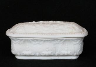[Rectangular-shaped lidded parian trinket box with low relief floral decoration]