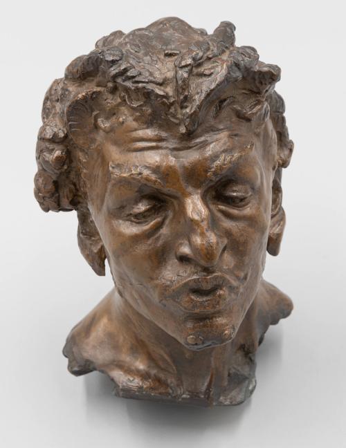 Bust of a young man whistling