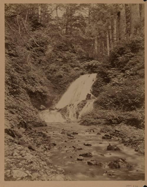 Waterfall with Buddha image