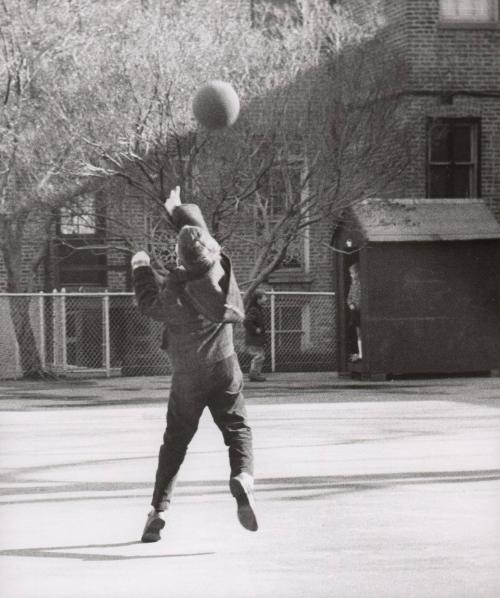 Untitled [boy throwing ball]