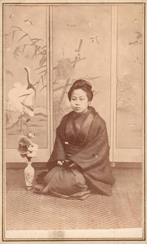 Woman with vase and screen