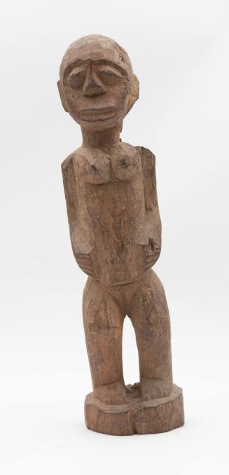 [Standing female figure]