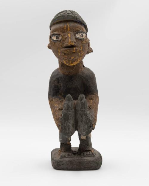 [Standing male figure]