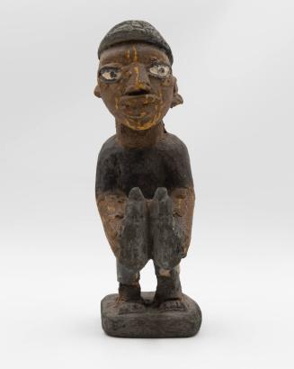 [Standing male figure]