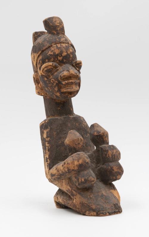 Kneeling male figure