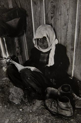 Bedouin child reading, Negev Desert, Israel