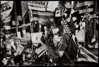 Memorial messages, flags, and flowers, World Trade Center, New York City, USA