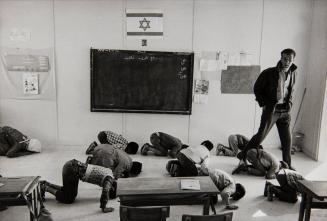 Children praying in school, Israel