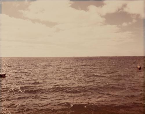 [Choppy water and sky]