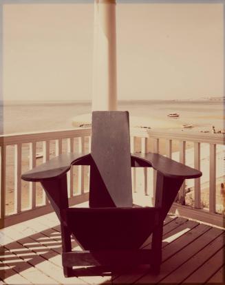 [Adirondack chair on the porch]