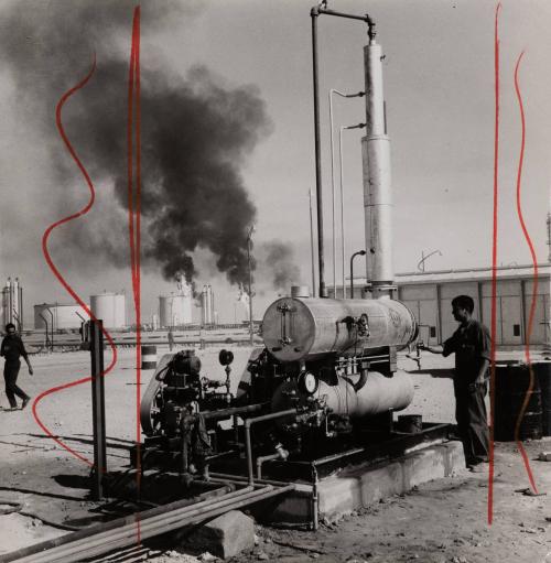 [Oil refinery (worker manning gears), Algeria]