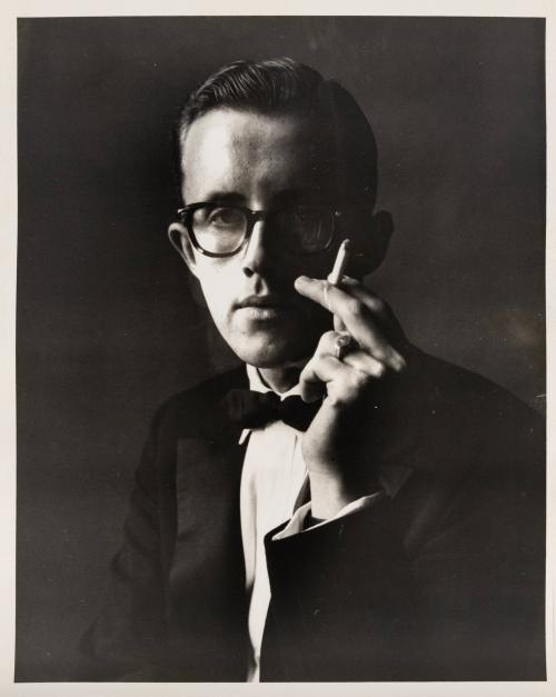 [Colpitts Menswear - man in glasses holding cigarette]