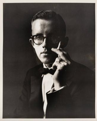 [Colpitts Menswear - man in glasses holding cigarette]