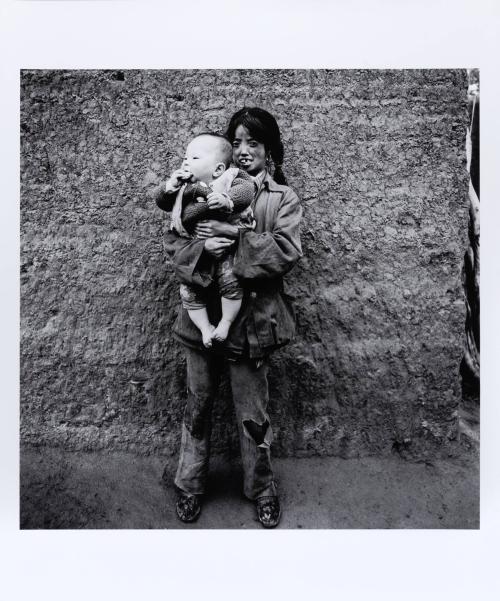 A Mentally Handicapped Muslim Girl with her Nephew, Xihaigu, Ningxia Province