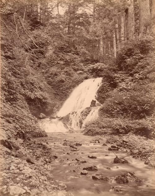 Waterfall with Buddha image